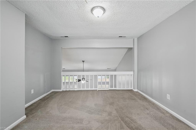 5101 Glenwood Way, Virginia Beach, VA 23456 - carpeted spare room with a textured ceiling, baseboards, ceiling fan, and lofted ceiling