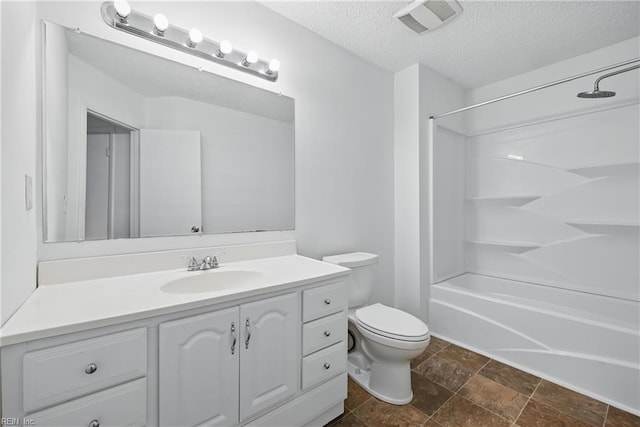 5101 Glenwood Way, Virginia Beach, VA 23456 - full bathroom with vanity,  shower combination, toilet, a textured ceiling, and stone finish floors