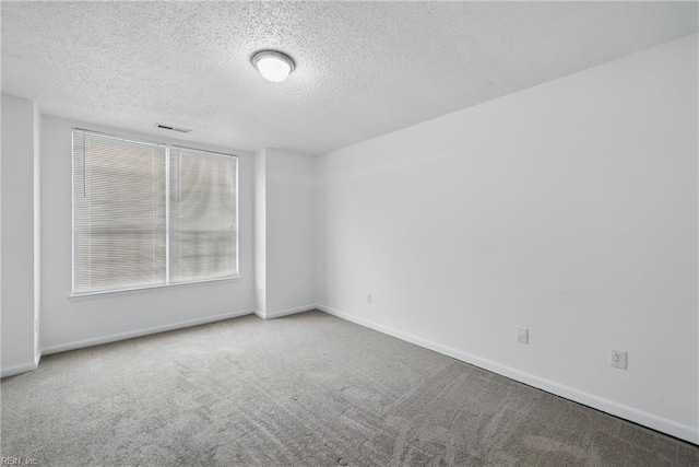 5101 Glenwood Way, Virginia Beach, VA 23456 - carpeted empty room featuring a textured ceiling and baseboards
