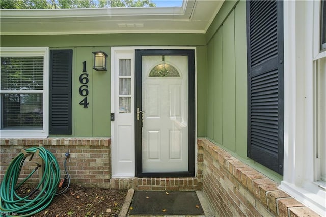 1664 Ashton Dr, Virginia Beach, VA 23464 - doorway to property featuring brick siding and a porch