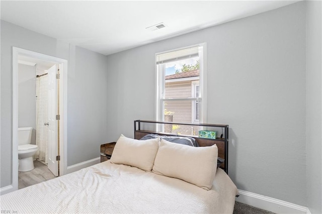 3607 Lafayette Blvd, Norfolk, VA 23513 - bedroom with baseboards and connected bathroom