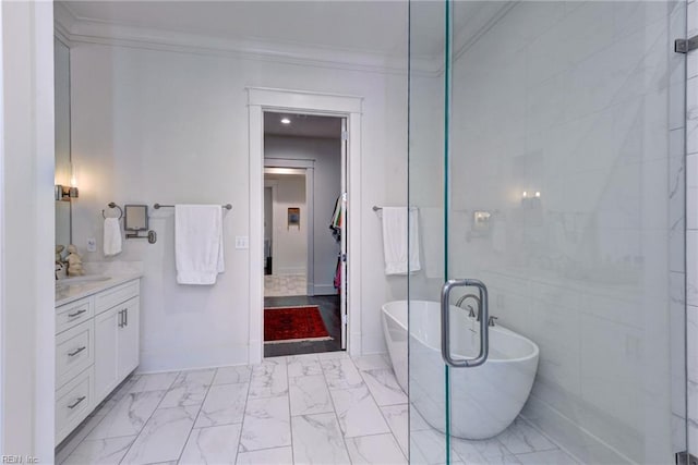 103 Enclave Ct, Williamsburg, VA 23185 - full bathroom with vanity, ornamental molding, marble look tiles, a freestanding tub, and baseboards