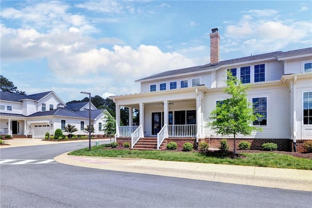103 Enclave Ct, Williamsburg, VA 23185 - view of front of home featuring covered porch, a ceiling fan, a chimney, an attached garage, and asphalt driveway