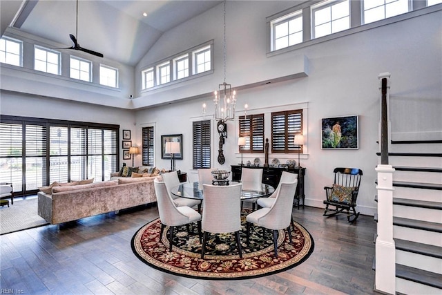 103 Enclave Ct, Williamsburg, VA 23185 - dining room with a ceiling fan, dark wood-style floors, high vaulted ceiling, baseboards, and stairs