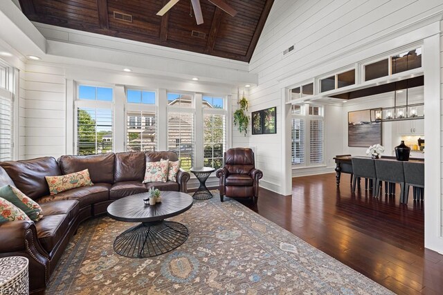 312 Cawdor Xing, Chesapeake, VA 23322 - living room featuring wood-type flooring, high vaulted ceiling, ceiling fan, wooden walls, and a chandelier