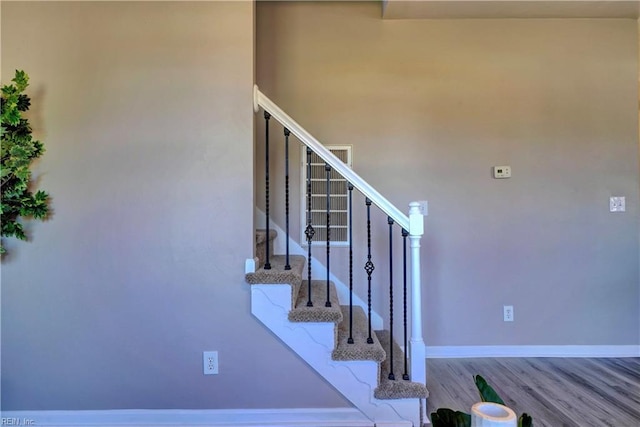 100 Langston Ct, Franklin, VA 23851 - staircase with wood finished floors and baseboards