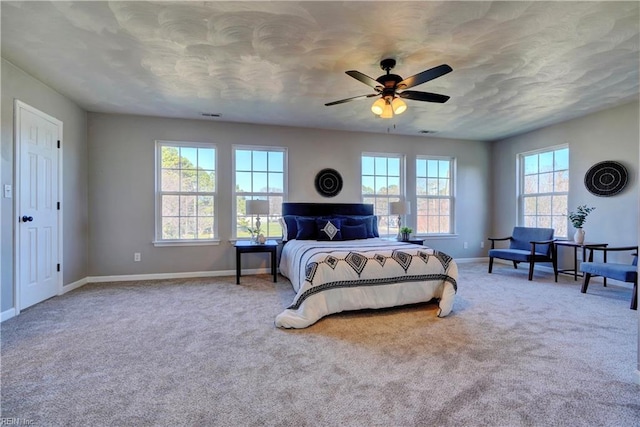 100 Langston Ct, Franklin, VA 23851 - carpeted bedroom with baseboards and a ceiling fan