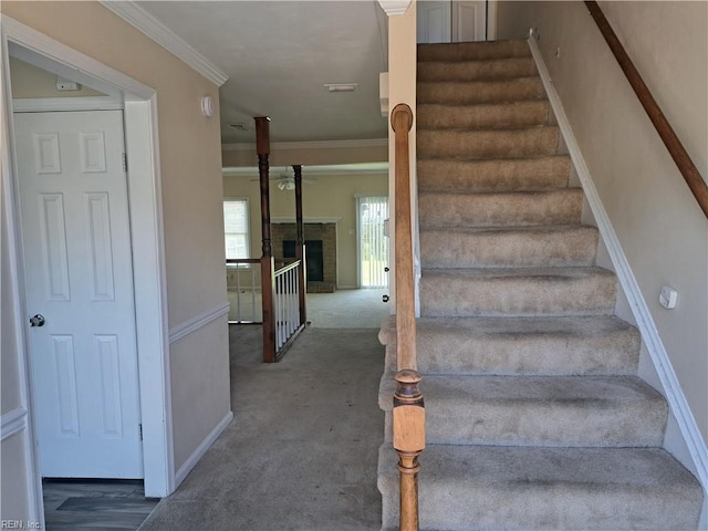5528 Baccalaureate Dr, Virginia Beach, VA 23462 - staircase featuring ornamental molding, carpet floors, baseboards, and a brick fireplace