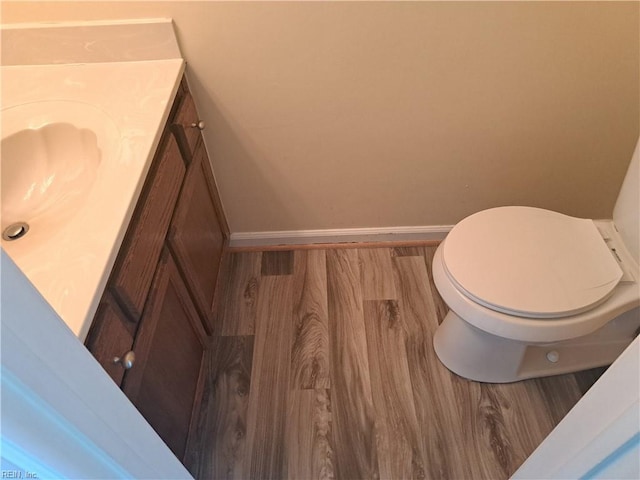 5528 Baccalaureate Dr, Virginia Beach, VA 23462 - half bath featuring vanity, wood finished floors, toilet, and baseboards
