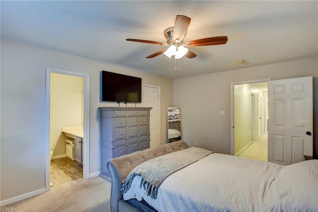 231 Sykes Ave Unit 231, Virginia Beach, VA 23454 - bedroom featuring light colored carpet, baseboards, a ceiling fan, and ensuite bath