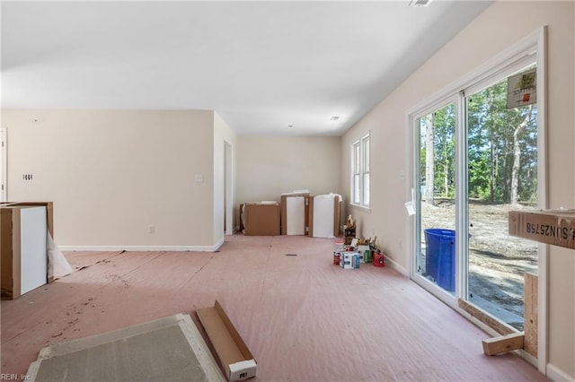 820 Briarwood Rd, Elizabeth City, NC 27909 - unfurnished living room with baseboards