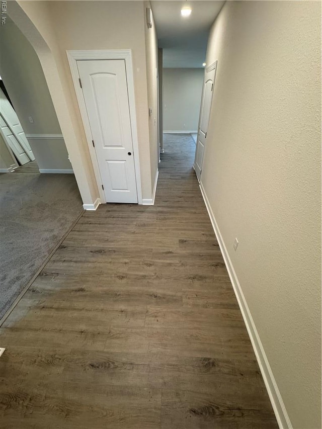 172 Honaker Ave, Norfolk, VA 23502 - corridor with baseboards, wood finished floors, and arched walkways