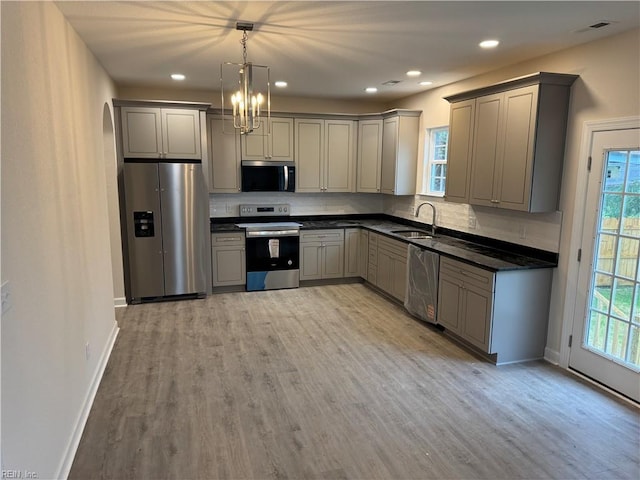 172 Honaker Ave, Norfolk, VA 23502 - kitchen featuring appliances with stainless steel finishes, gray cabinets, a sink, tasteful backsplash, and recessed lighting