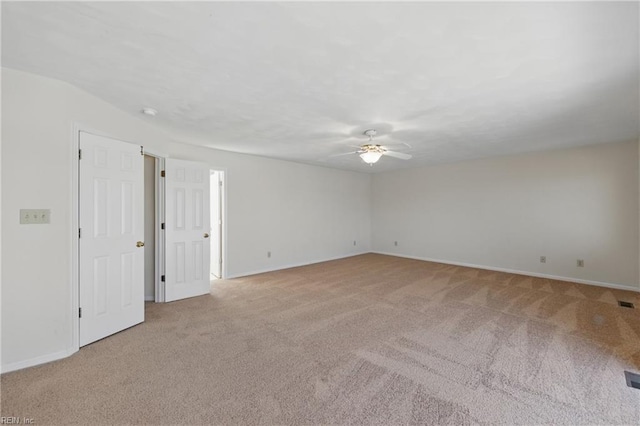 9489 Mooring Dr, Norfolk, VA 23518 - spare room with light carpet, a ceiling fan, and baseboards