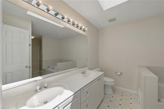9489 Mooring Dr, Norfolk, VA 23518 - bathroom featuring a bath, double vanity, toilet, a shower, and baseboards