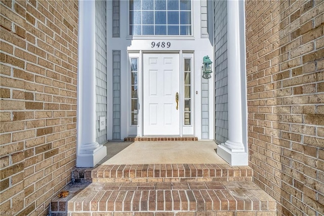 9489 Mooring Dr, Norfolk, VA 23518 - entrance to property featuring brick siding and covered porch