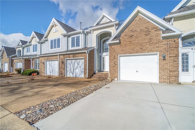 9489 Mooring Dr, Norfolk, VA 23518 - multi unit property featuring concrete driveway and brick siding