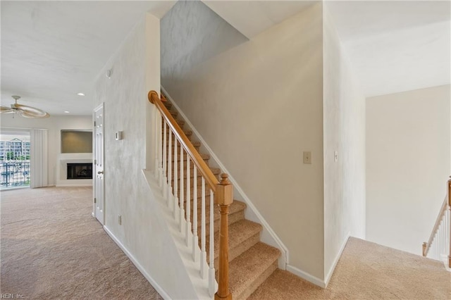 9489 Mooring Dr, Norfolk, VA 23518 - staircase featuring carpet, a ceiling fan, baseboards, and a fireplace
