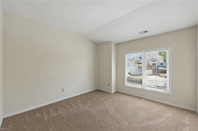 9489 Mooring Dr, Norfolk, VA 23518 - carpeted empty room featuring baseboards and vaulted ceiling