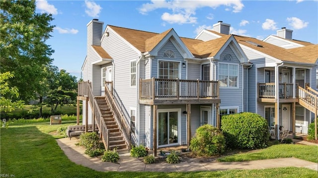 3566 Brigita Ct, Virginia Beach, VA 23453 - back of property featuring a chimney, stairs, and a lawn