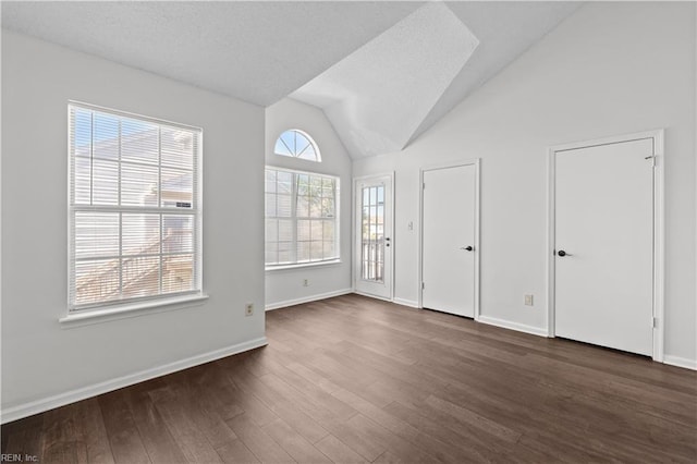 3566 Brigita Ct, Virginia Beach, VA 23453 - unfurnished bedroom with dark wood-style flooring, vaulted ceiling, and baseboards