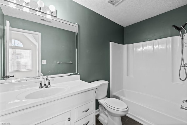 3566 Brigita Ct, Virginia Beach, VA 23453 - bathroom with vanity, toilet, shower / bath combination, a textured ceiling, and tile patterned flooring