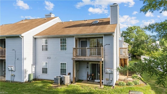 3566 Brigita Ct, Virginia Beach, VA 23453 - rear view of property featuring a balcony, central air condition unit, a chimney, and a lawn