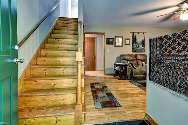 2944 Ridge Rd, Cobbs Creek, VA 23035 - staircase featuring ceiling fan and wood finished floors
