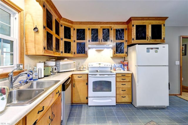 2944 Ridge Rd, Cobbs Creek, VA 23035 - kitchen with white appliances, exhaust hood, a sink, light countertops, and glass insert cabinets