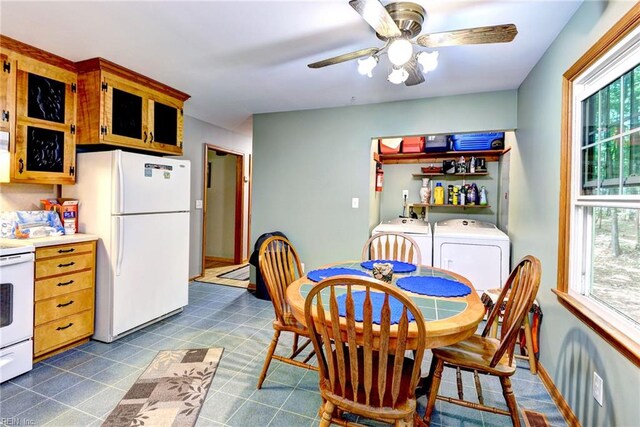 2944 Ridge Rd, Cobbs Creek, VA 23035 - dining room with washing machine and dryer and a ceiling fan