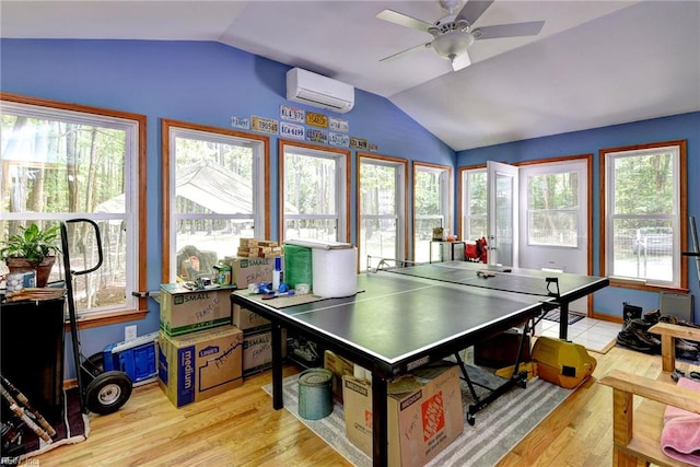 2944 Ridge Rd, Cobbs Creek, VA 23035 - game room with a wall mounted air conditioner, vaulted ceiling, light wood-style flooring, and ceiling fan