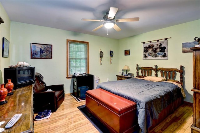 2944 Ridge Rd, Cobbs Creek, VA 23035 - bedroom with hardwood / wood-style floors, ceiling fan, and baseboards