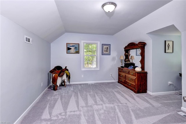 2944 Ridge Rd, Cobbs Creek, VA 23035 - carpeted bedroom with vaulted ceiling and baseboards
