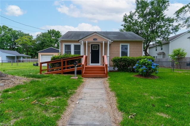 3302 Elliott Ave, Portsmouth, VA 23702 - bungalow-style home featuring an outbuilding