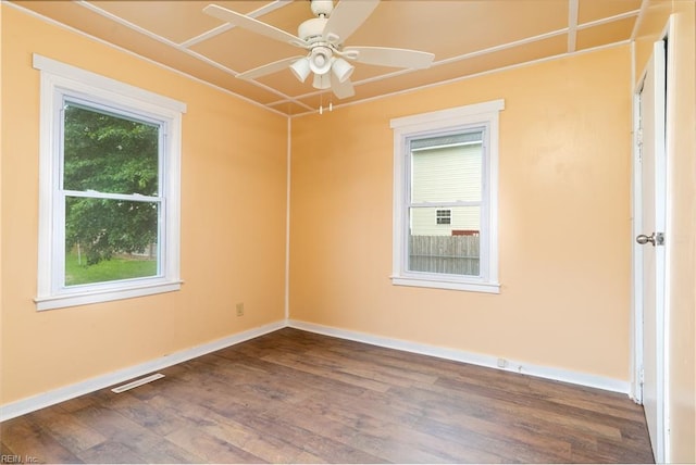 3302 Elliott Ave, Portsmouth, VA 23702 - unfurnished room featuring dark wood-style floors, ceiling fan, and baseboards