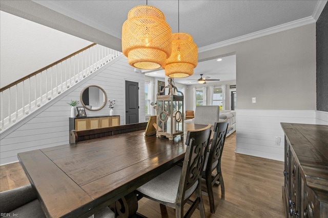 3012 George Starr Dr, Virginia Beach, VA 23456 - dining space with wood finished floors, stairway, a ceiling fan, ornamental molding, and a chandelier