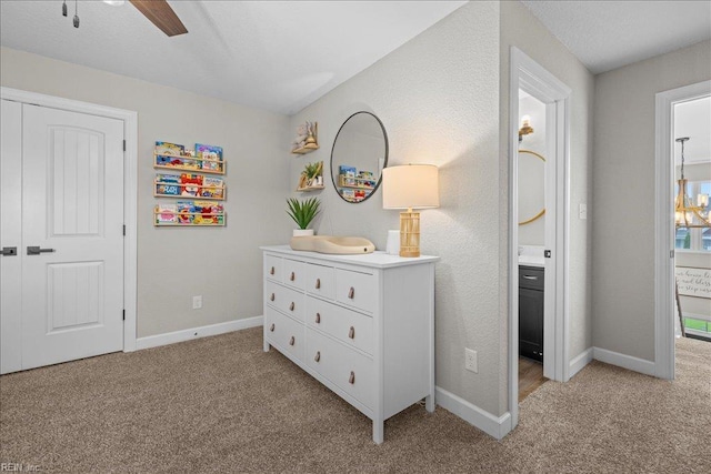 3012 George Starr Dr, Virginia Beach, VA 23456 - bedroom featuring light colored carpet, baseboards, connected bathroom, and ceiling fan