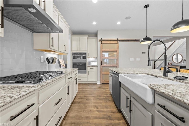 3012 George Starr Dr, Virginia Beach, VA 23456 - kitchen featuring extractor fan, appliances with stainless steel finishes, a sink, decorative backsplash, and dark wood finished floors