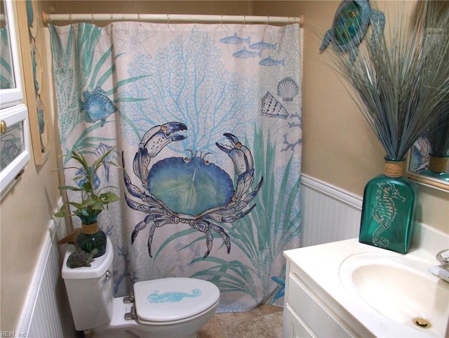 450 Benthall Rd, Hampton, VA 23664 - full bath featuring toilet, wainscoting, vanity, and curtained shower