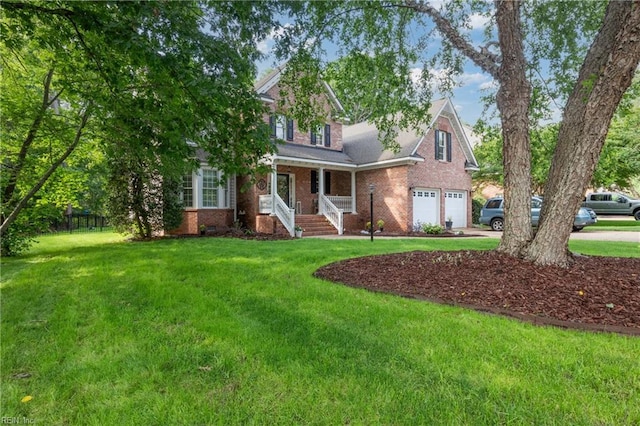 20185 Harbour Rdg, Smithfield, VA 23430 - view of front of property with an attached garage, brick siding, driveway, and a front lawn