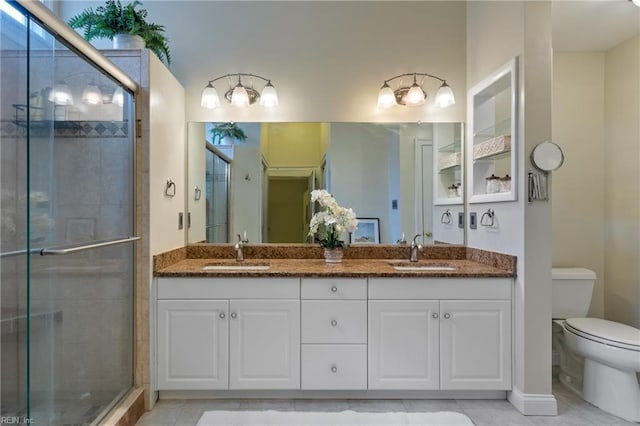 20185 Harbour Rdg, Smithfield, VA 23430 - bathroom with toilet, double vanity, a shower stall, baseboards, and tile patterned floors