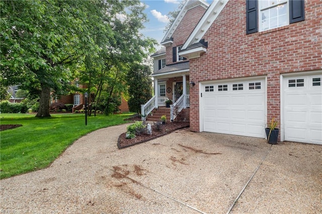 20185 Harbour Rdg, Smithfield, VA 23430 - view of front facade featuring driveway, a front lawn, brick siding, and an attached garage