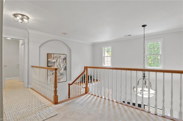 20185 Harbour Rdg, Smithfield, VA 23430 - hallway featuring plenty of natural light, baseboards, crown molding, an upstairs landing, and carpet floors