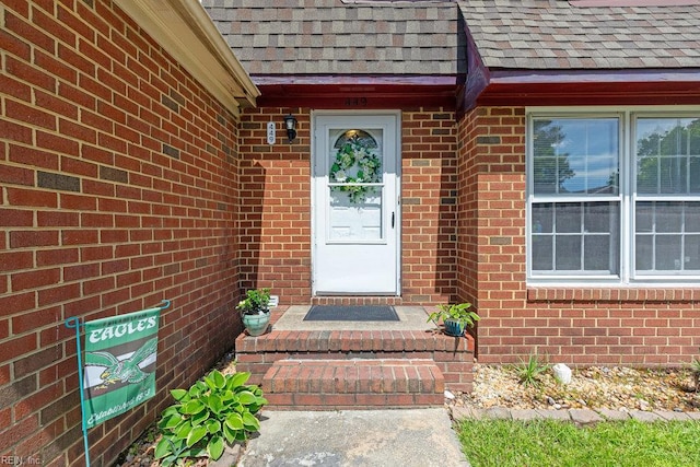 449 Wayman Ln, Virginia Beach, VA 23454 - view of exterior entry with roof with shingles and brick siding