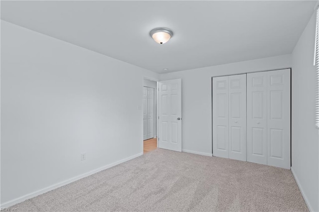 1215 Hale Dr, Hampton, VA 23663 - unfurnished bedroom featuring carpet floors, baseboards, and a closet