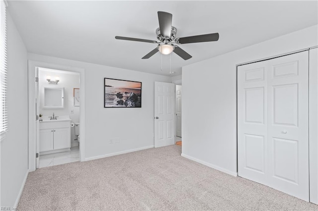 1215 Hale Dr, Hampton, VA 23663 - unfurnished bedroom with baseboards, light colored carpet, a closet, and ensuite bath