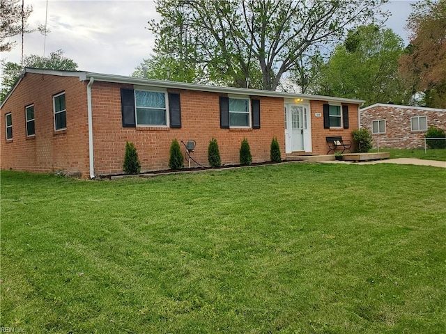 1215 Hale Dr, Hampton, VA 23663 - ranch-style house with brick siding and a front yard