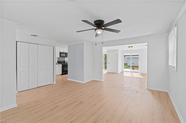 1215 Hale Dr, Hampton, VA 23663 - unfurnished living room with light wood finished floors, ceiling fan, and baseboards