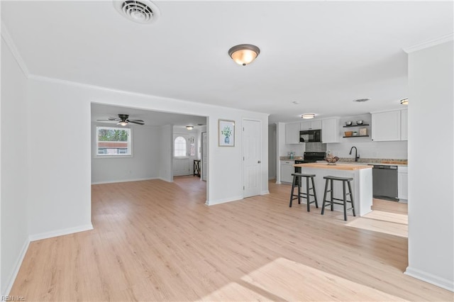 1215 Hale Dr, Hampton, VA 23663 - living area with light wood-style flooring, a ceiling fan, baseboards, and ornamental molding
