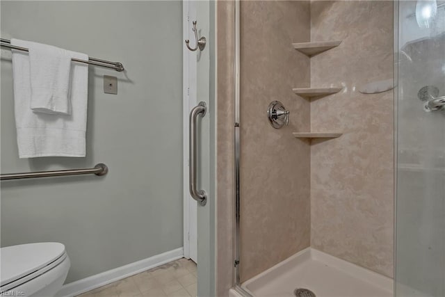 506 Everett Dr, Elizabeth City, NC 27909 - full bathroom with a shower stall, toilet, and baseboards